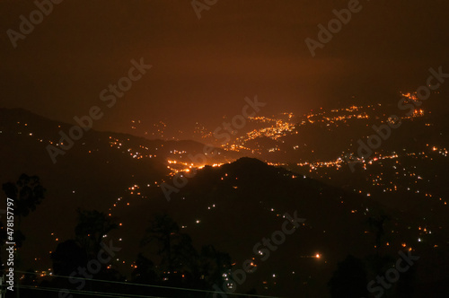 Beautiful night image of Darjeeling, Queen of Hills, West Bengal, India. Lights glowing.