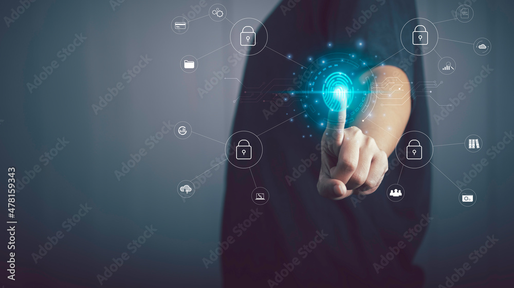 Person scanning fingerprint on the virtual screen to protect secure information on Internet, cyber security , big data, document management, data transfer, cloud computing, internet of things concept. Person scanning fingerprint on the virtual screen to protect secure information on Internet, cyber security , big data, document management, data transfer, cloud computing, internet of things concept.