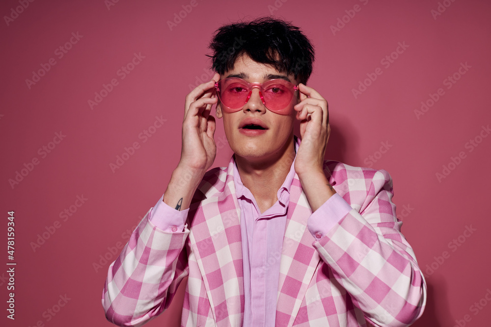 pretty man in pink glasses pink blazer posing studio Lifestyle unaltered pretty man in pink glasses pink blazer posing studio Lifestyle unaltered