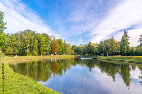 Fototapeta Naklejka Na Ścianę i Meble -  Autumn view on pond in millennium park in Chojnice, Poland.