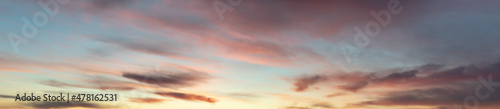 Sunrise with orange and pink clouds. Panoramic, panorama, banner. © bios48