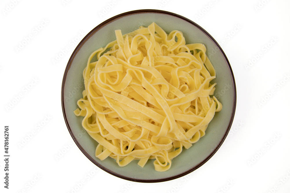 pasta on plate isolated on white background pasta on plate isolated on white background