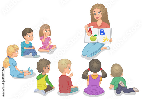A kindergarten teacher teaches children to read.