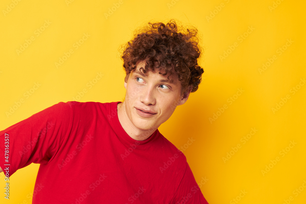 guy with red curly hair summer style fashion posing yellow background unaltered guy with red curly hair summer style fashion posing yellow background unaltered