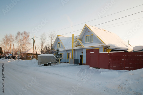 Several village houses on the outskirts of Tyumen, Russia © strekoza