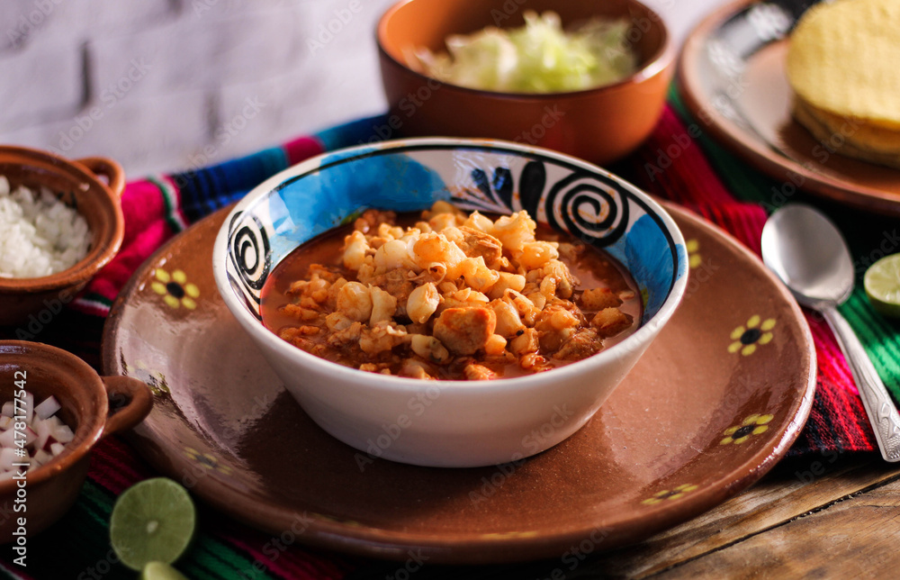 red pozole, with pork and vegetables, radish, onion, lettuce, served with toasted tortillas red pozole, with pork and vegetables, radish, onion, lettuce, served with toasted tortillas