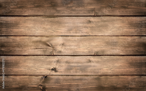 Aged wooden board, dark brown. Background, wood texture.