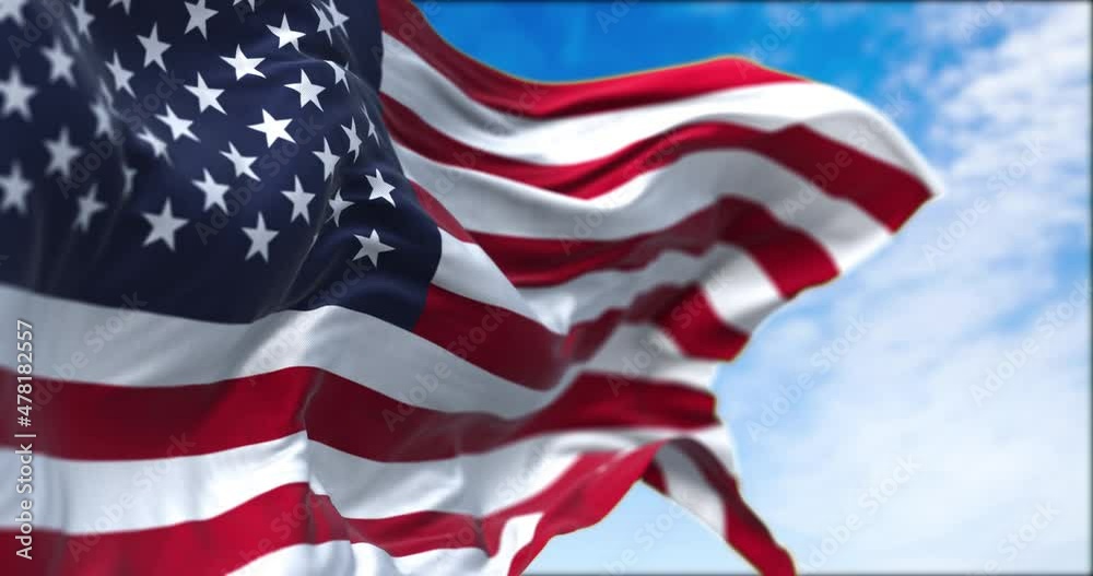 The national flag of the United States of America waving in the wind