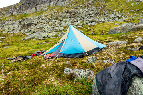 Travelling above the tree line in Alaska's Northern Talkeetna Mountains, a backpacking expedition relies on lightweight tarps and tents for shelter.