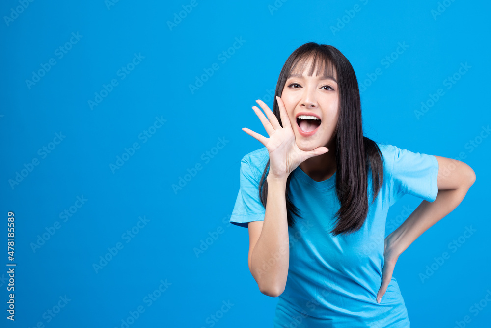 Portrait of beautiful young Asian girl model long hair in casual summer clothes smile, happy and enjoying in studio isolated on yellow background. Portrait of beautiful young Asian girl model long hair in casual summer clothes smile, happy and enjoying in studio isolated on yellow background.