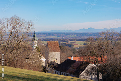 View from the cemetery in Wessobrunn in Bavaria to the town and the monastery photo