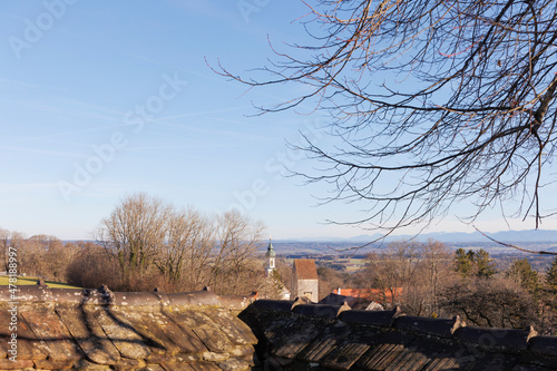 View from the cemetery in Wessobrunn in Bavaria to the town and the monastery photo