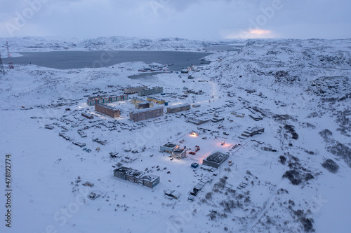 Aerial view of Teriberka village at the North of Russia at Barents sea coast during polar night photo