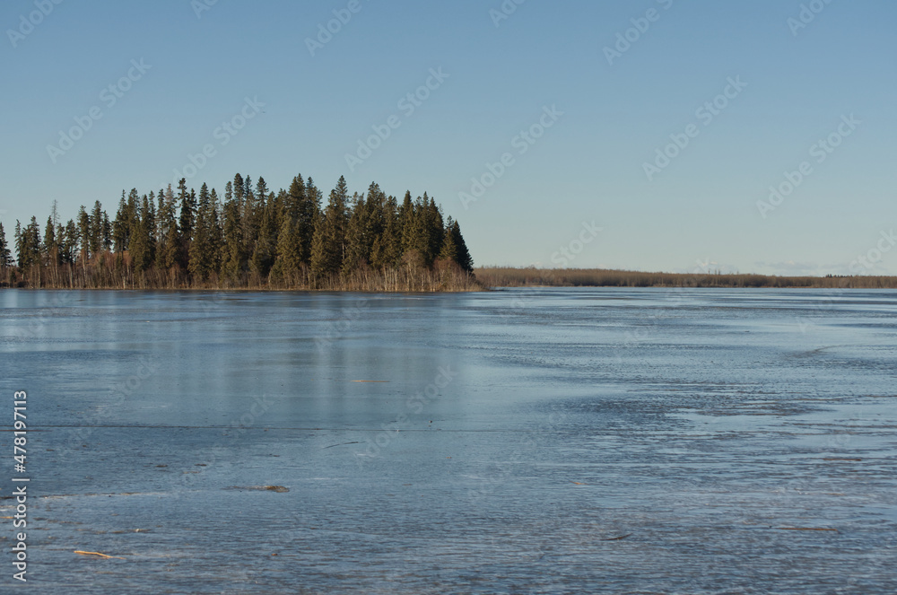 A Lone Island in a Frozen Lake