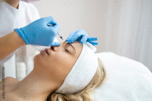Beauty Injections. Woman On Rejuvenation Procedure In Clinic