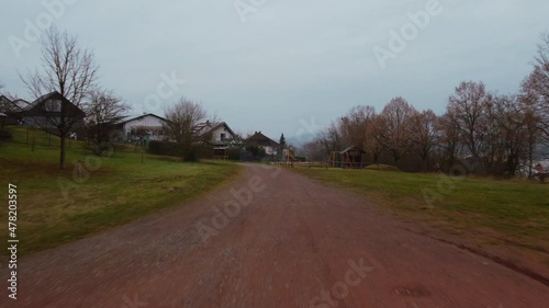 Aerial Rural Village Reveal From Path