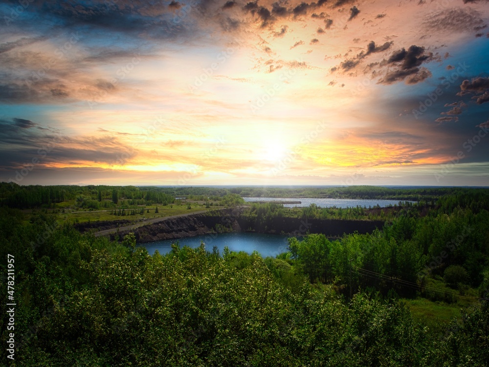Sunrise on a hill, Minnesota gravel pit, mining ore