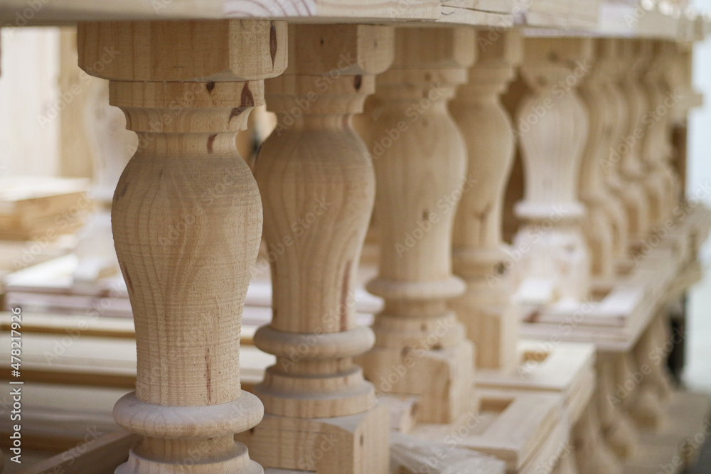 Fototapeta premium Wooden pillars in perspective