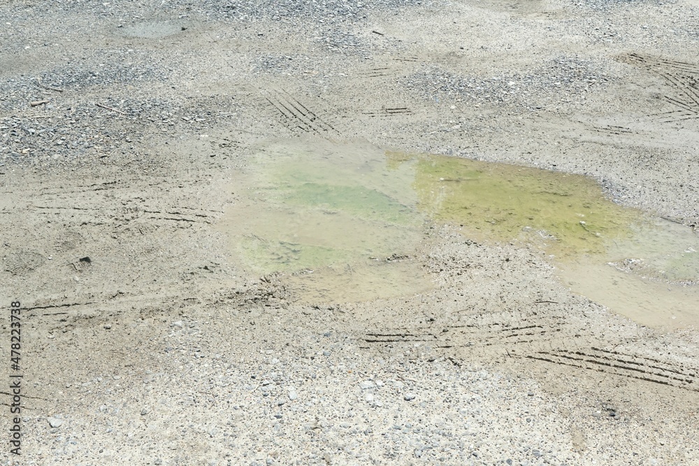 Obraz premium close up wheel track on muddy