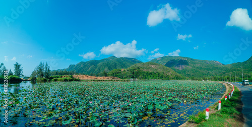 Clear view with An Hai Lake and mountain at Con Dao. Natural color Crystal Blue lake.  photo