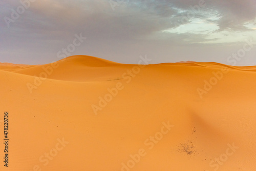 Fototapeta Naklejka Na Ścianę i Meble -  Beautiful landscape of the dunes of the Sahara Desert at dusk, Merzouga, morocco