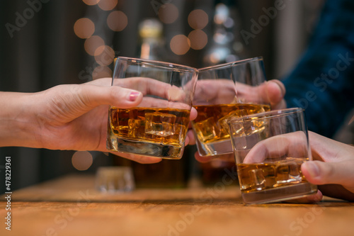 Fényképezés Celebrate whiskey on a friendly party in  restaurant