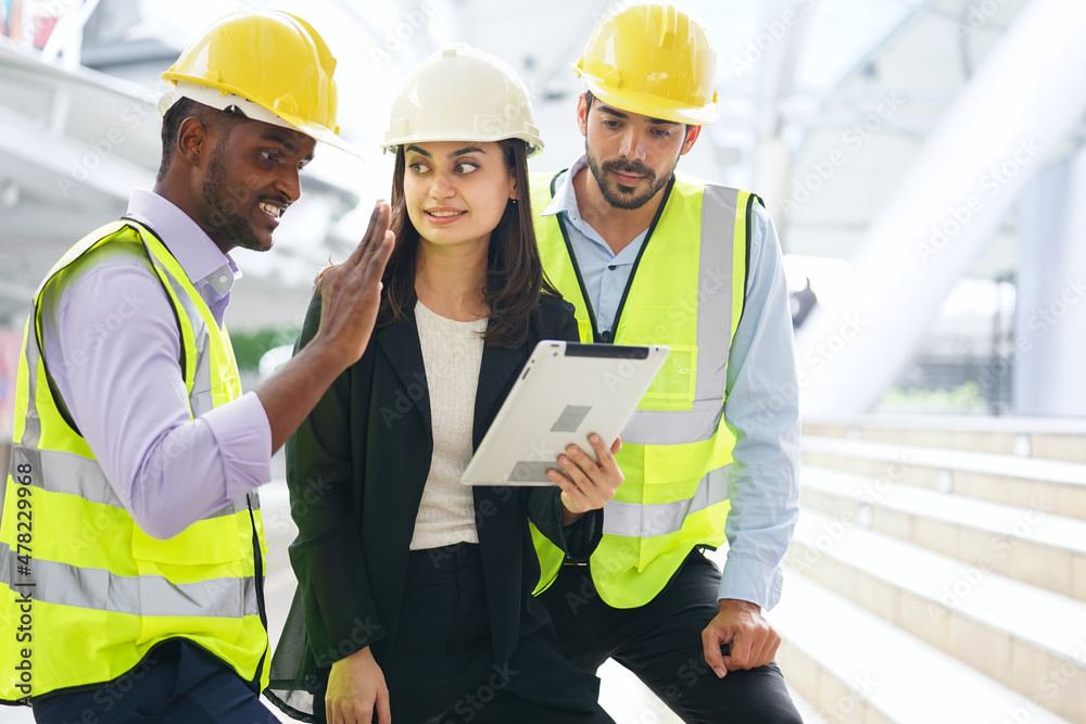 engineers team discussing a job to make decision on outside building engineers team discussing a job to make decision on outside building