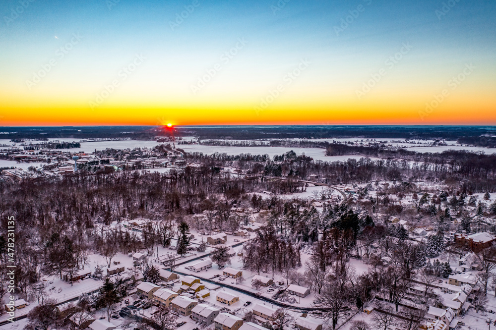 Sunset over snowy town