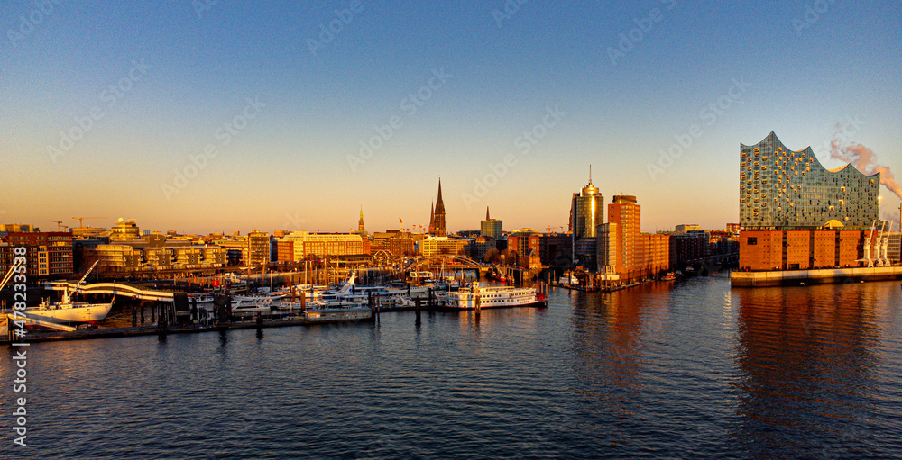 Wonderful view over Hamburg harbour and the Elbphilharmonie Concert Hall at sunset - drone photography Germany from above