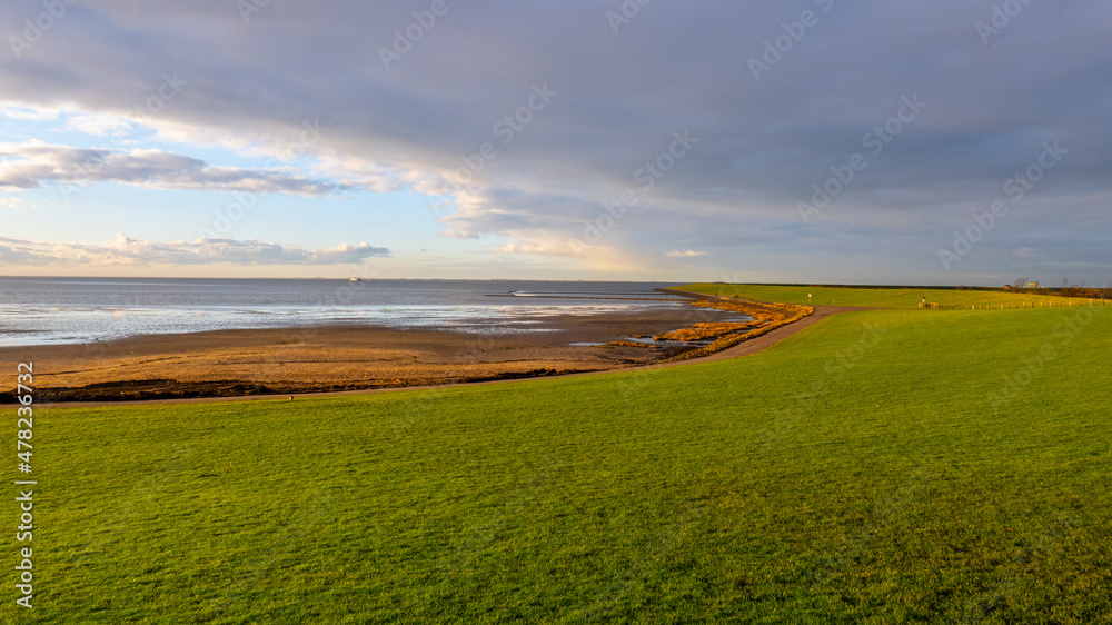 The beautiful landscape of Nordstrand Germany at the Wadden Sea - drone photography Germany from above The beautiful landscape of Nordstrand Germany at the Wadden Sea - drone photography Germany from above