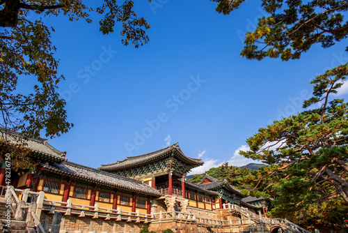 Beautiful and colorful autumn Korean temple Bulgulsa with yellow,orange and red leaves,