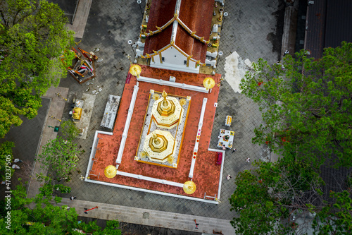 Wat Phra That Doi Tung from above birdeyes view, a famous Temple and Buddhism place. It's settled on the mountain in Chiang Rai province, north of Thailand. photo