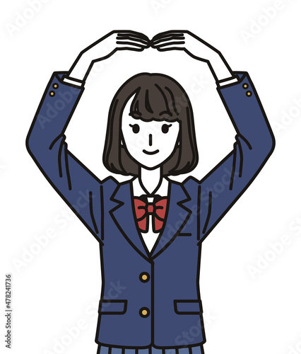 手でまるのジェスチャーをする女子中学生・高校生