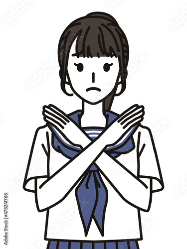 手でばつのジェスチャーをするセーラー服の女子中学生・高校生