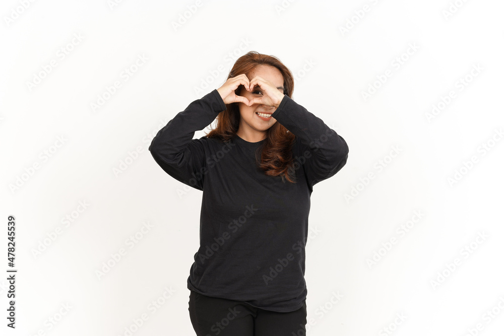 Showing Love or Heart Sign Of Beautiful Asian Woman Wearing Black Shirt Isolated On White Background Showing Love or Heart Sign Of Beautiful Asian Woman Wearing Black Shirt Isolated On White Background