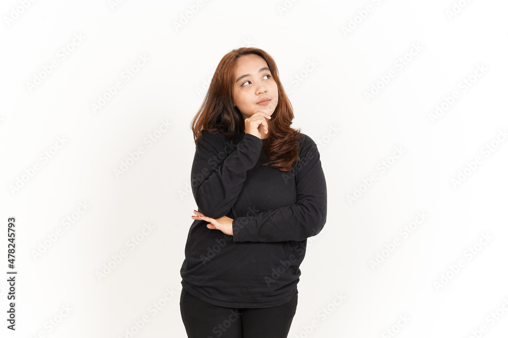 Thinking Gesture Of Beautiful Asian Woman Wearing Black Shirt Isolated On White Background Thinking Gesture Of Beautiful Asian Woman Wearing Black Shirt Isolated On White Background