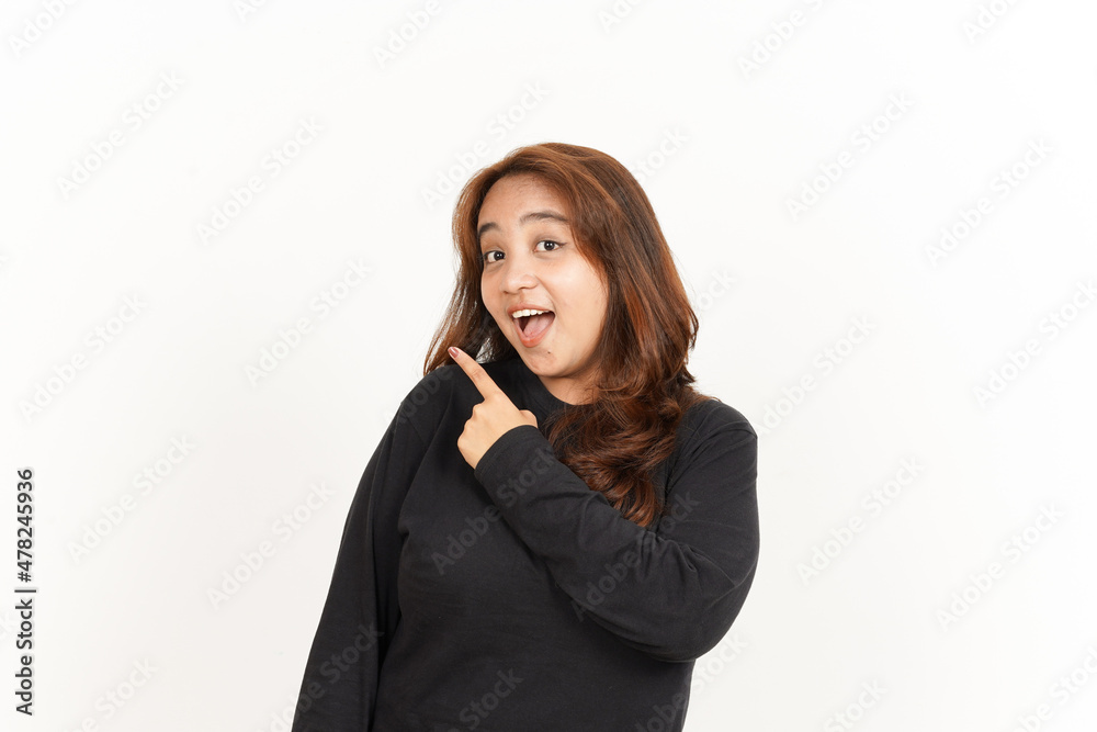 Pointing Aside Of Beautiful Asian Woman Wearing Black Shirt Isolated On White Background Pointing Aside Of Beautiful Asian Woman Wearing Black Shirt Isolated On White Background