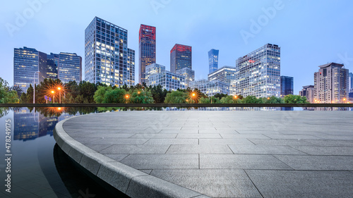Fotografia Panoramic skyline and modern commercial office buildings with empty circular square in Beijing, China