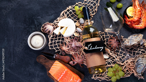 Bilde på lerret White wine Chardonay with seafood and snacks.