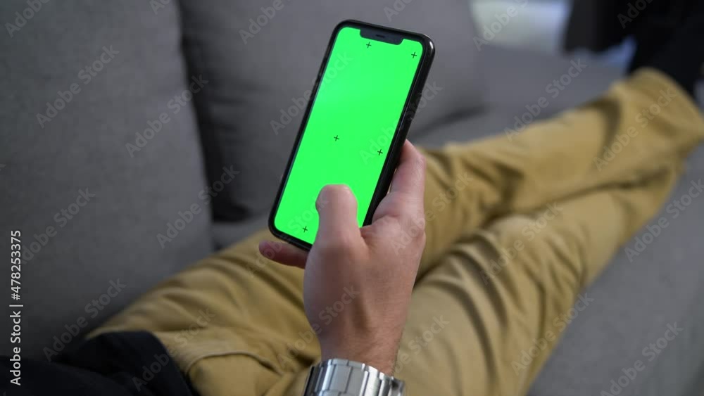 Man Swiping on Smart Phone Green Screen Tracking Points