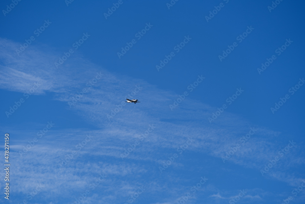 Propeller airplane up in the air at Zürich Airport on a sunny winter day with clouds. Photo taken December 31st, 2021, Zurich, Switzerland. Propeller airplane up in the air at Zürich Airport on a sunny winter day with clouds. Photo taken December 31st, 2021, Zurich, Switzerland.