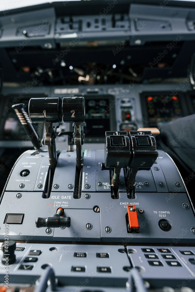Close up focused view of cockpit electronics and control devices Close up focused view of cockpit electronics and control devices