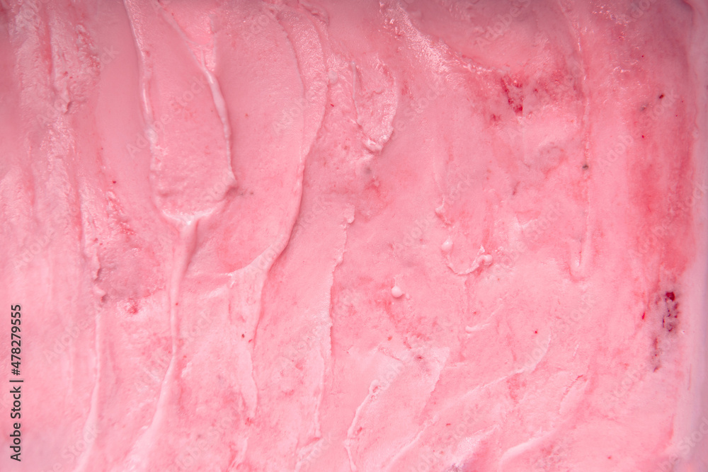 Closeup sweet strawberry pink or pale red ice cream made from real fruit texture background with natural light Closeup sweet strawberry pink or pale red ice cream made from real fruit texture background with natural light