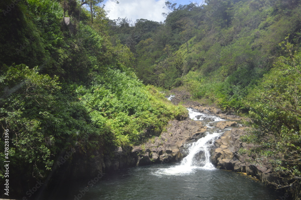 Waterfall along road to Hana, Maui Waterfall along road to Hana, Maui