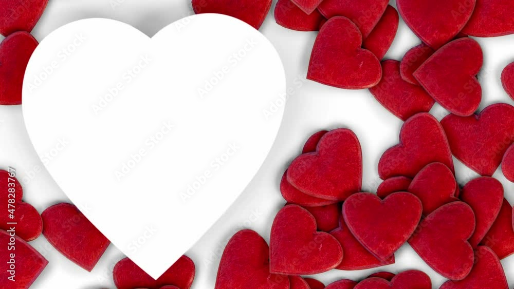 Large group of red hearts being moved underneath the blank paper in a heart shape. Valentine's Day and Love concept. High quality 4k video. Large group of red hearts being moved underneath the blank paper in a heart shape. Valentine's Day and Love concept. High quality 4k video.