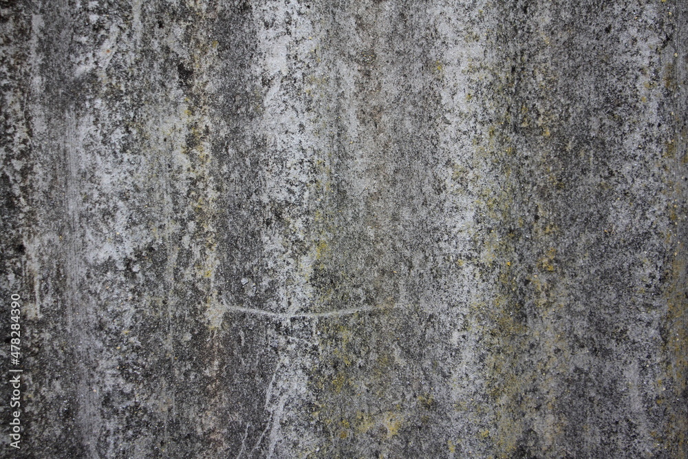 Old dry concrete wall with yellow spots background texture Old dry concrete wall with yellow spots background texture