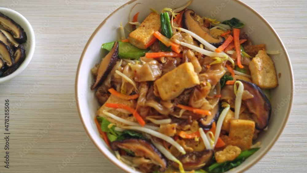 stir-fried noodles with tofu and vegetables - vegan and vegetarian food style stir-fried noodles with tofu and vegetables - vegan and vegetarian food style