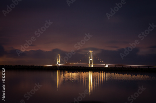 The Great Belt Bridge illuminated at night