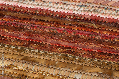 Colorful fabrics stacked on top of each other