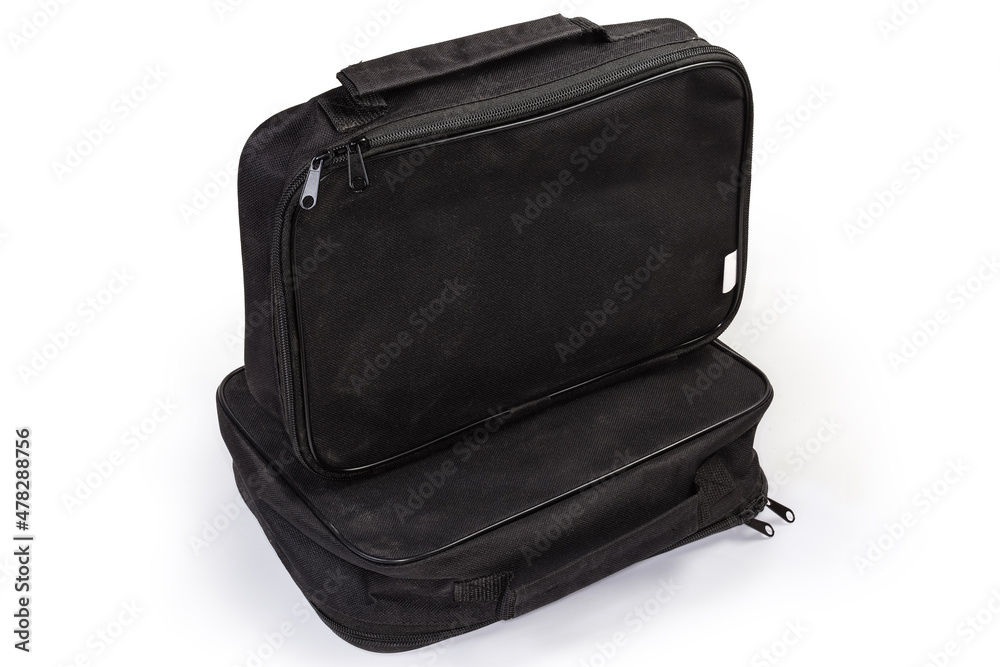 Small flat black textile bags with handles on white background Small flat black textile bags with handles on white background